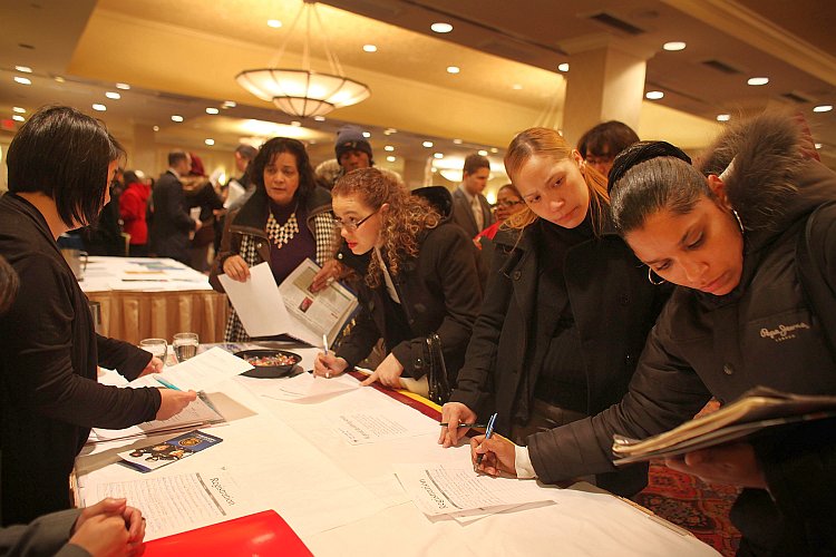 Young job seekers attend a career fair in Midtown Manhattan