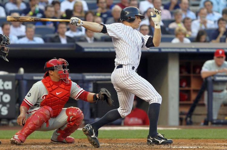 Pitcher Andy Pettitte won the second of two games for New York against the Minnesota Twins on Wednesday. (Hannah Foslien / Getty Images)