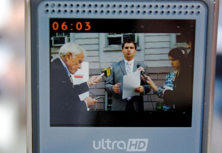 Alex Zablocki, seen through the LCD display screen of an Ultra HD recorder outside City Hall, New York City, on Wednesday. (Matthew Robertson/The Epoch Times)