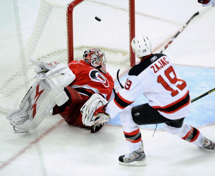 OT WINNER: Travis Zajac wins Game 3 for the Devils on Sunday night in Raleigh, North Carolina. ( Grant Halverson/Getty Images)