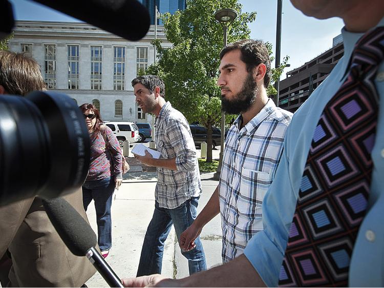 Najibullah Zazi (R), 24, arrives at the Byron G. Rogers Federal Building in downtown with his attorney Art Folsom (not pictured) September 17, 2009 in Denver, Colorado. (Marc Piscotty/Getty Images)