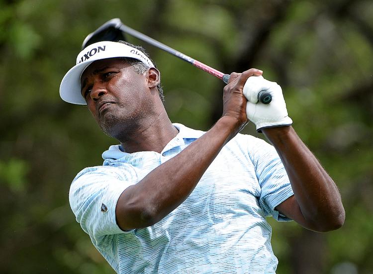 Vijay Singh tees off the eighth hole during the first round of the Valero Texas Open at the TPC San Antonio on May 13, 2010. (Marc Feldman/Getty Images)