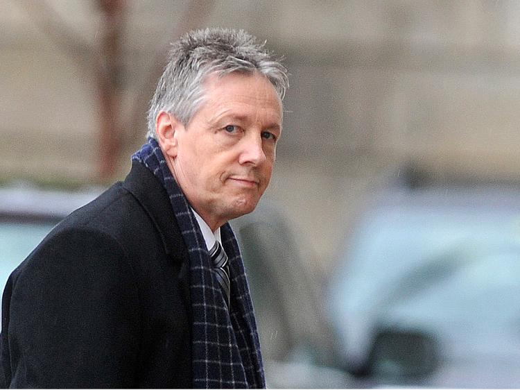 Northern Ireland's First Minister Peter Robinson arrives at Stormont Government buildings in Belfast, Northern Ireland, on January 11, 2010. (Peter Muhly/AFP/Getty Images)