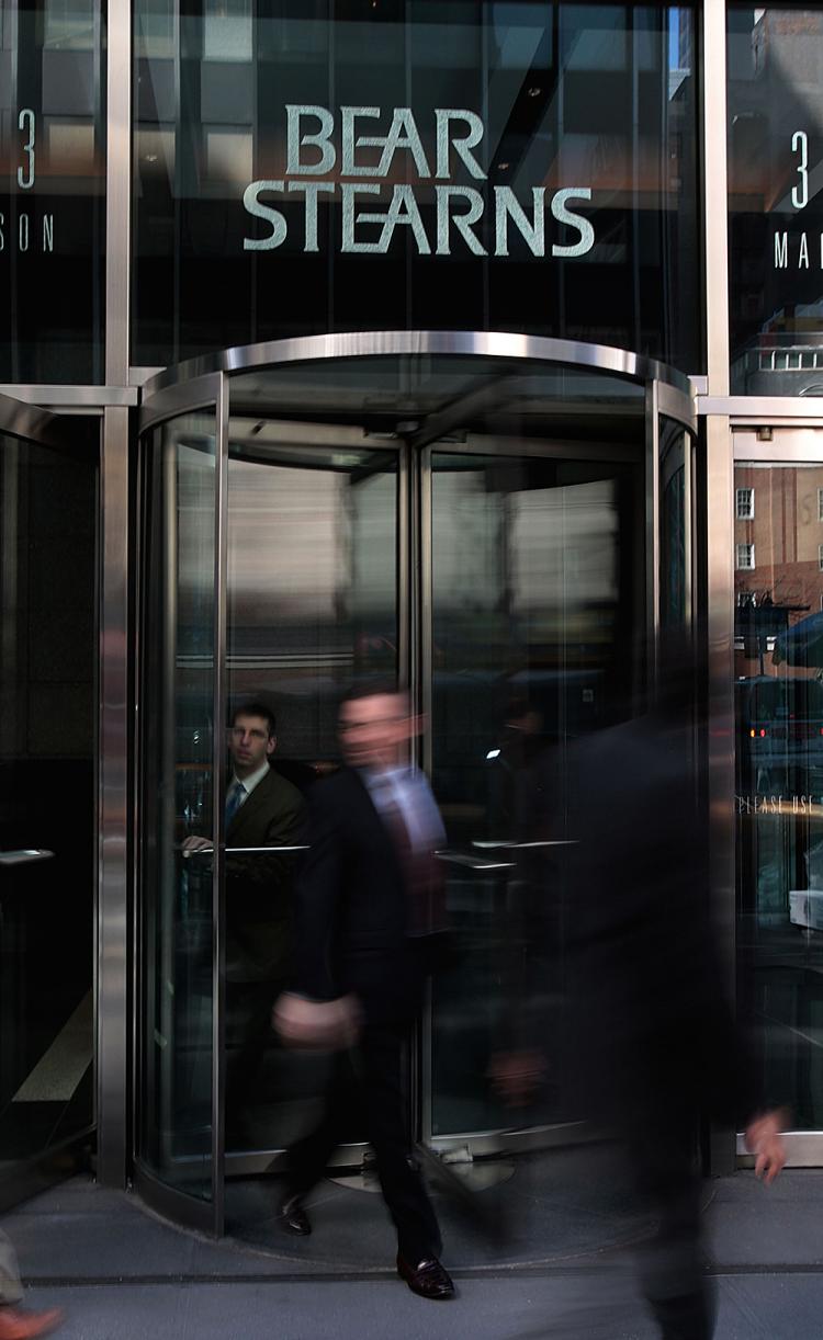 People walk out of Bear Stearns headquarters in New York City.    (Chris Hondros/Getty Images)