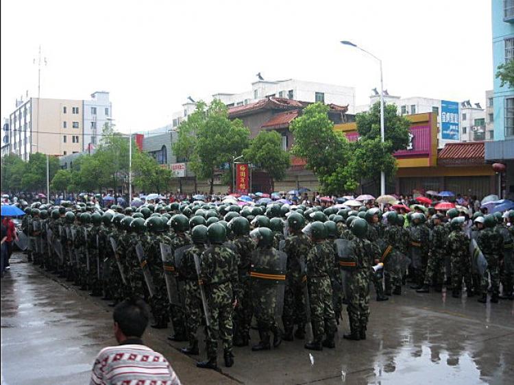 Armed riot police in Shishou City