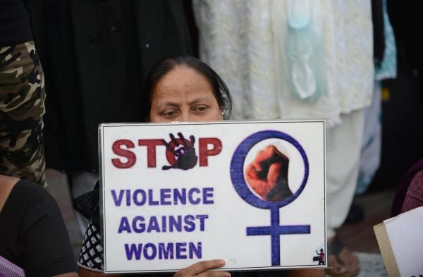 A woman attends a peace protest in Ahmedabad, India, on March 20, 2015, in the wake of the gang-rape on an elderly nun. (Sam Panthaky/AFP/Getty Images)