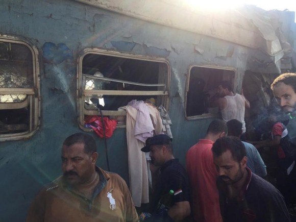 Egyptians search for survivors at the site of a crash where two trains collided near the Khorshid station in Egypt's coastal city of Alexandria, Egypt August 11, 2017. (Reuters/Osama Nageb)