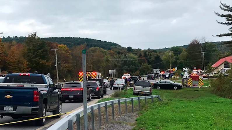 Emergency personnel respond to the limousine crash