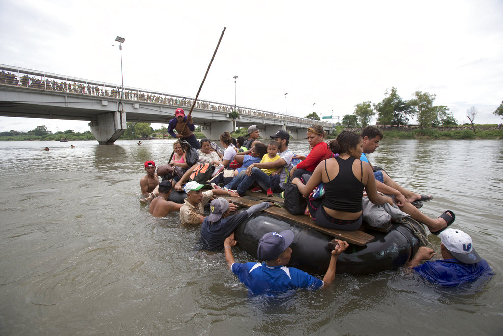Migrants illegally enter Mexico