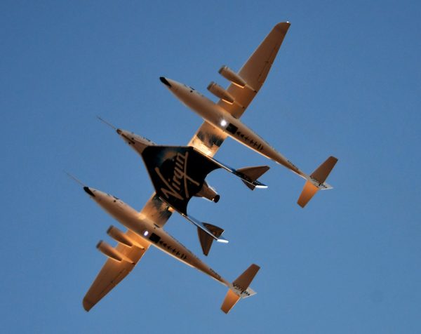 Virgin Galactic’s carrier airplane WhiteKnightTwo carrying space tourism rocket plane SpaceShipTwo takes off