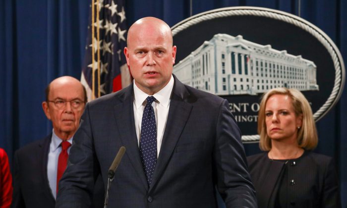 Acting Attorney General Matthew Whitaker announces indictments against Chinese telecommunications company Huawei, with Commerce Secretary Wilbur Ross (L), Homeland Security Secretary Kirstjen Nielsen (R), and other officials at the Department of Justice in Washington on Jan. 28, 2019. (Charlotte Cuthbertson/The Epoch Times)