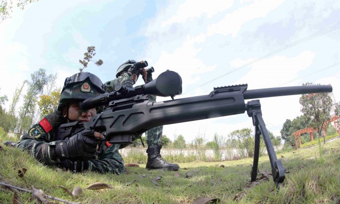 This photo taken on July 1, 2018 shows Chinese paramilitary personnel training in Chenzhou in China's central Hunan province. (-/AFP/Getty Images)