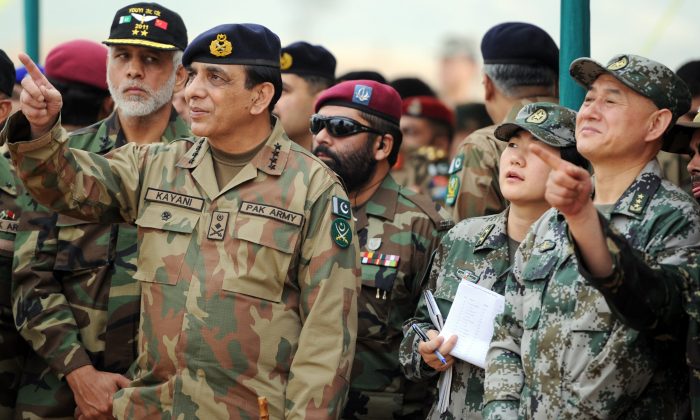 Pakistan's army chief General Ashfaq Kayani (L) and General Hou Shusen (R), Deputy Chief of  Staff of Chinese People's Liberation Army (PLA), watch the Pakistan-China military drill in Jhelum, Pakistan, on November 24, 2011.  (Aamir QureshiAFP/Getty Images)