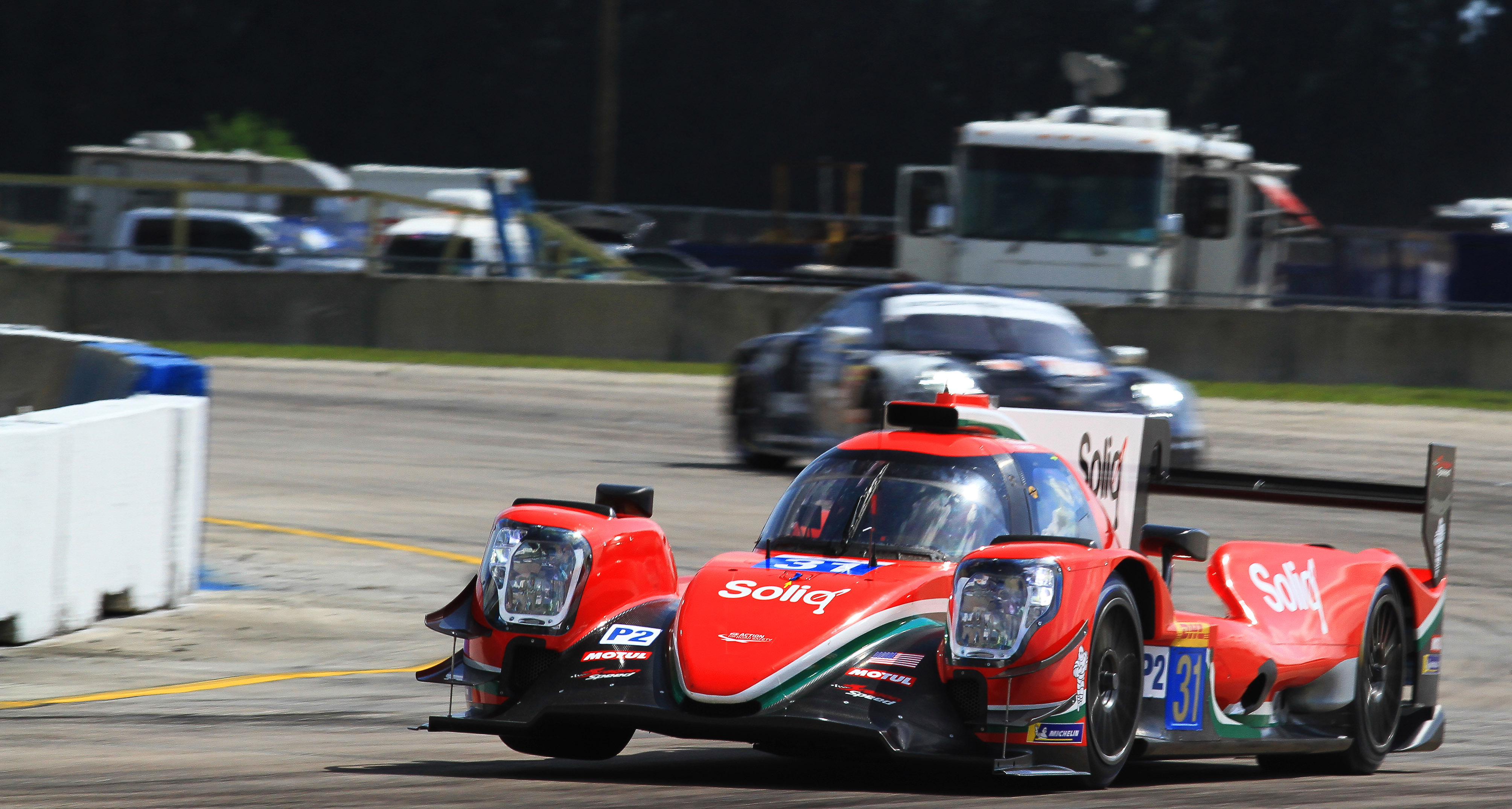 The #31 LMP2 Dragonspeed Oreca bounces through Turn 17