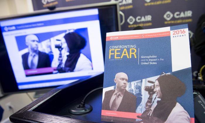 A report titled "Confronting Fear," about Islamophobia in the United States released by the Council on American-Islamic Relations (CAIR), is seen at their headquarters in Washington, DC, June 20, 2016. (SAUL LOEB/AFP/Getty Images)