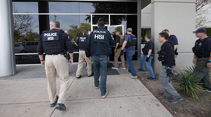 Immigrations officials arrested more than 280 illegal aliens at a company in Allen, Texas. (Immigration and Customs Enforcement) 