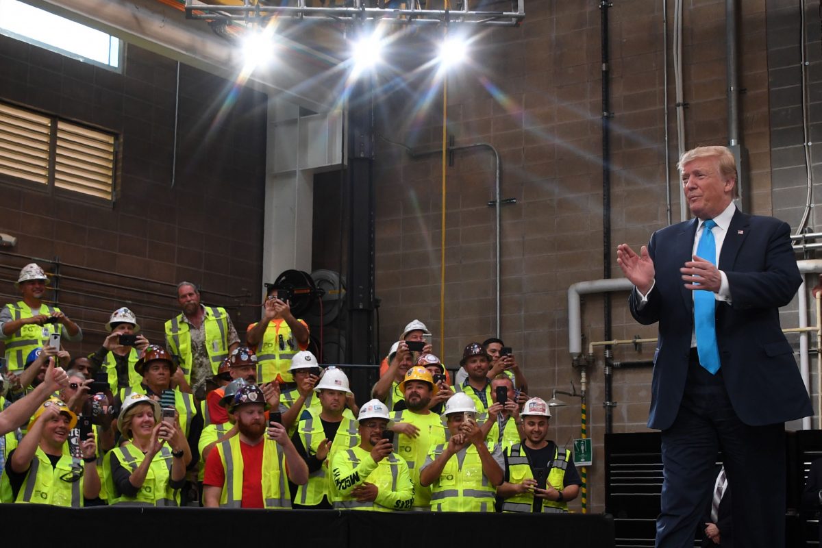 President Donald Trump arrives to sign the decrees on energy and infrastructure at the International Training and Education Center of the International Union of Professional Engineers in Crosby