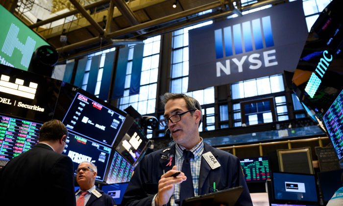 A trader works ahead of the closing bell on the floor of the New York Stock Exchange (NYSE) in New York City on March 18, 2019. (Johannes Eisele/AFP/Getty Images)