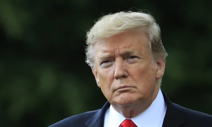 President Donald Trump walks on the South Lawn as he leaves the White House in Washington on May 20, 2019. (Manuel Balce Ceneta/AP)