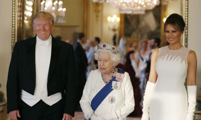 Queen Elizabeth II (C),U.S. President Donald Trump (L) and First Lady Melania Trump (R) attend a State Banquet at Buckingham Palace on June 3, 2019 in London, England. President Trump's three-day state visit will include lunch with the Queen, and a State Banquet at Buckingham Palace, as well as business meetings with the Prime Minister and the Duke of York, before travelling to Portsmouth to mark the 75th anniversary of the D-Day landings. (Jeff Gilbert - WPA Pool/Getty Images)