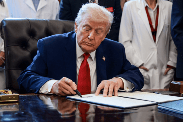 Trump Signs a Proclamation in Oval Office
