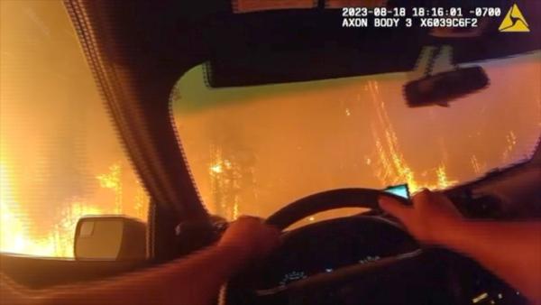 Driving Through Wildfire: Deputy Narrowly Escapes Oregon Road Fire Flames
