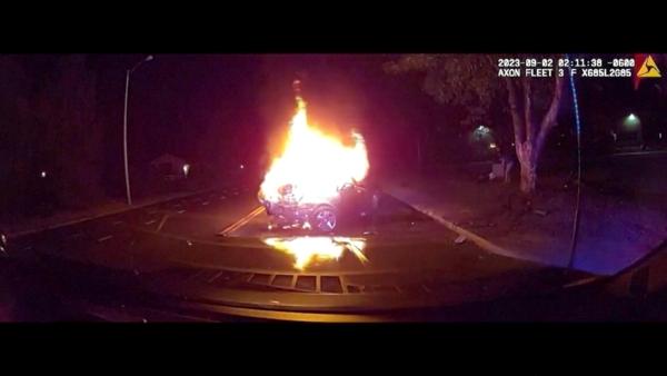 Colorado Officer Rescues Person Right Before Car Is Fully Engulfed in Flames