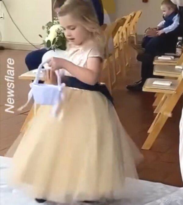 Flower Girl Does Amazing Job at Her Godfather’s Wedding
