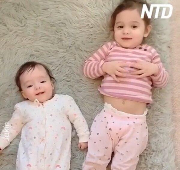 Little Girl Tells Baby Sister She Loves Her, Poses for Pictures