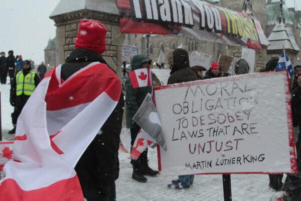 Protesters on Wellington St near Parliament Hill in Ottawa on Feb. 12, 2022. (Richard Moore/The Epoch Times)