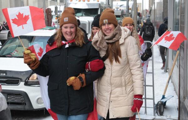 Thousands of people backing the truckers poured into Ottawa on Feb. 12 and Feb. 13, 2022. (Richard Moore/The Epoch Times)
