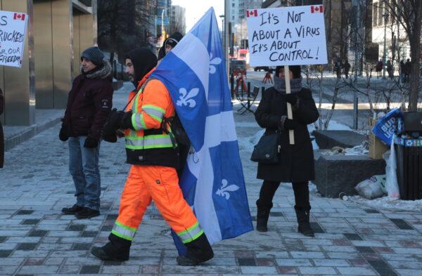 There were plenty of flags of the Canadian province of Quebec in Ottawa during the Freedom Convoy protest. (Richard Moore/The Epoch Times)
