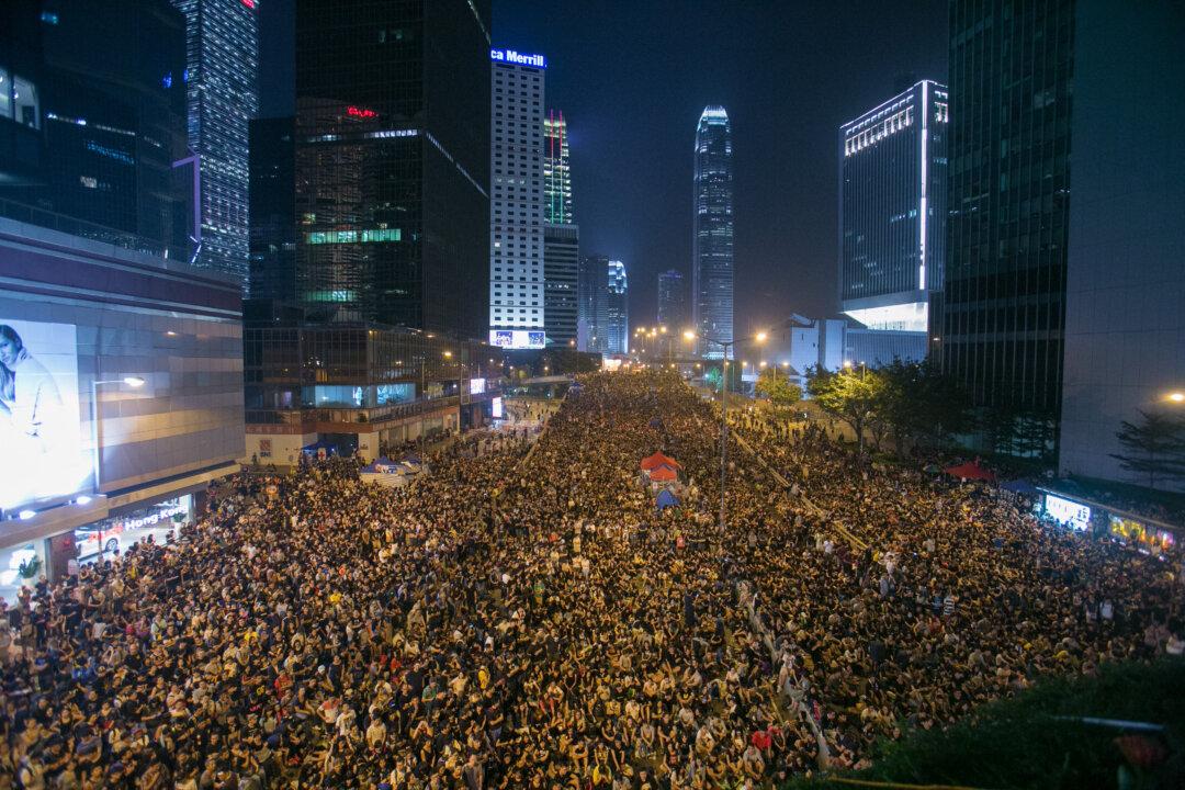 A Cyberwar Quietly Rages Over Hong Kong