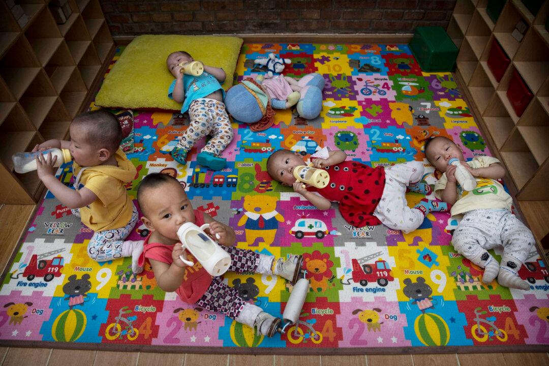 China’s New Two-Child Policy: Throwing a Bone to the Public as the Economy Declines