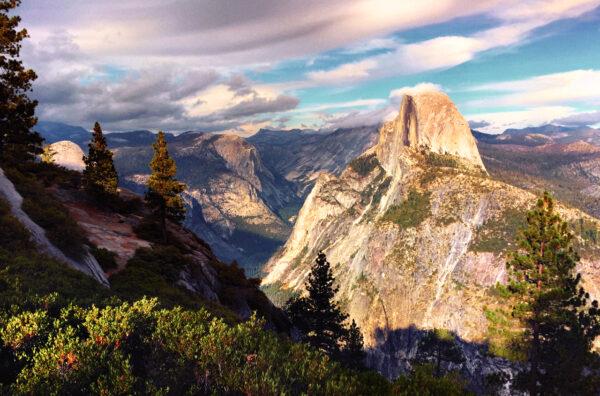 A dramatically beautiful sunset view of Half Dome, as seen from Glacier Point.