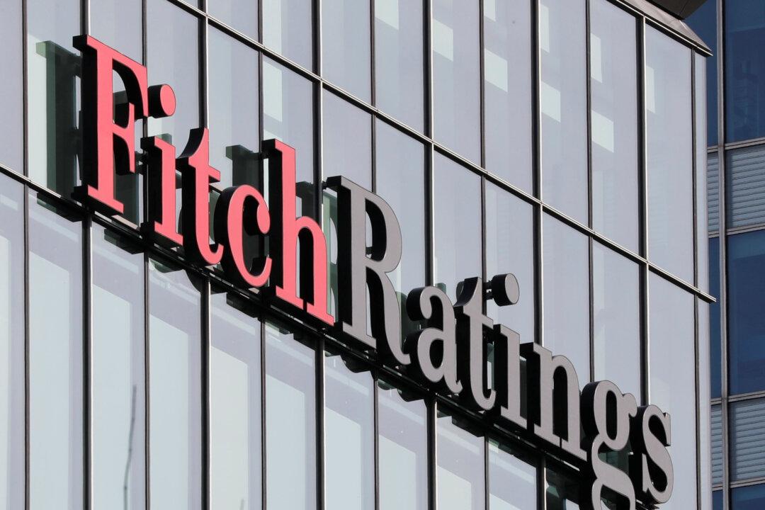 Fitch Downgrades China to Negative on Rising Public Finance Risks