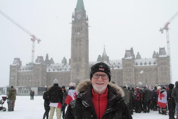 Denis Cadieux supports the Ottawa protests but would like to remove some negative messages, photo taken on Feb. 12, 2022. (Richard Moore/The Epoch Times)