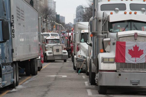 Protest trucks have been parked in central Ottawa streets for more than two weeks by Feb. 14, 2022. This image was taken on Feb. 11. (Richard Moore/The Epoch Times)