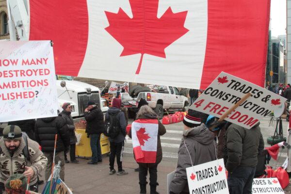 Signs and flags were everywhere during the truckers' occupation of central Ottawa. (Richard Moore/The Epoch Times)