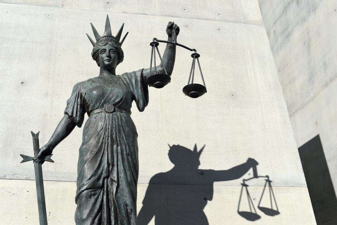 Burglar Jailed for Killing Man, Slashing Wife in Home