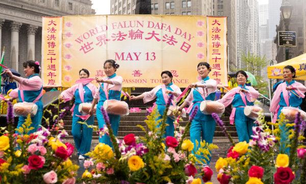 Falun Gong practitioners take part in an event to celebrate World Falun Dafa Day in Foley Square in New York City on May 7, 2022. (Samira Bouaou/The Epoch Times)