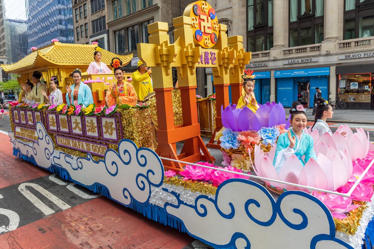 Falun Gong practitioners take part in a parade marking the 30th anniversary of its introduction to the public, in Manhattan, New York, on May 13, 2022. (Mark Zou/The Epoch Times)