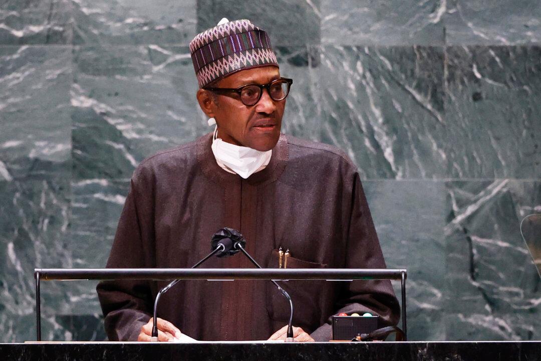 Nigeria’s Buhari Steps Down as President Amid Religious Massacres and War Crimes Allegations