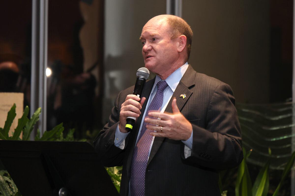 Sen. Chris Coons (D-Del.) speaks at the CARE International Women's Day Dinner in Washington, on March 08, 2023. (Paul Morigi/Getty Images for CARE)