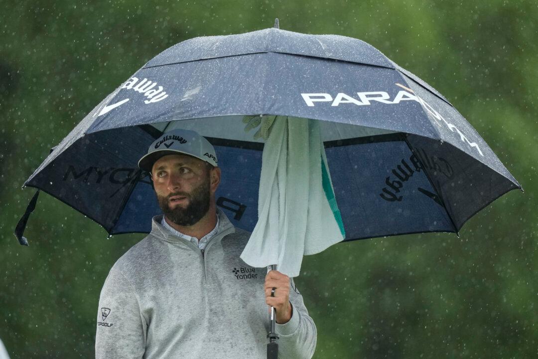 Survival at Masters as Rahm Stays Close and Woods Makes Cut—Round 3 Suspended