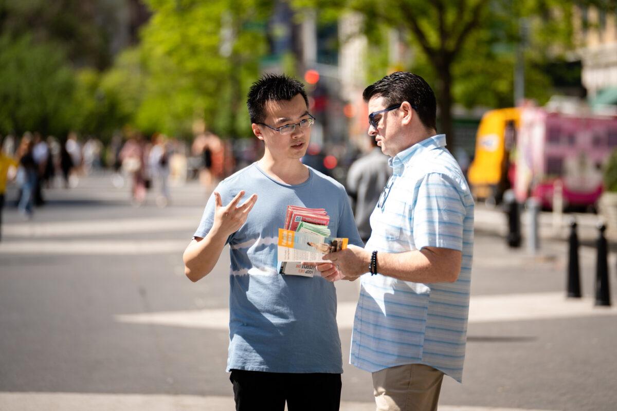 Falun Gong practitioners celebrate World Falun Dafa Day in New York City on May 7, 2023. (Samira Bouaou/The Epoch Times)