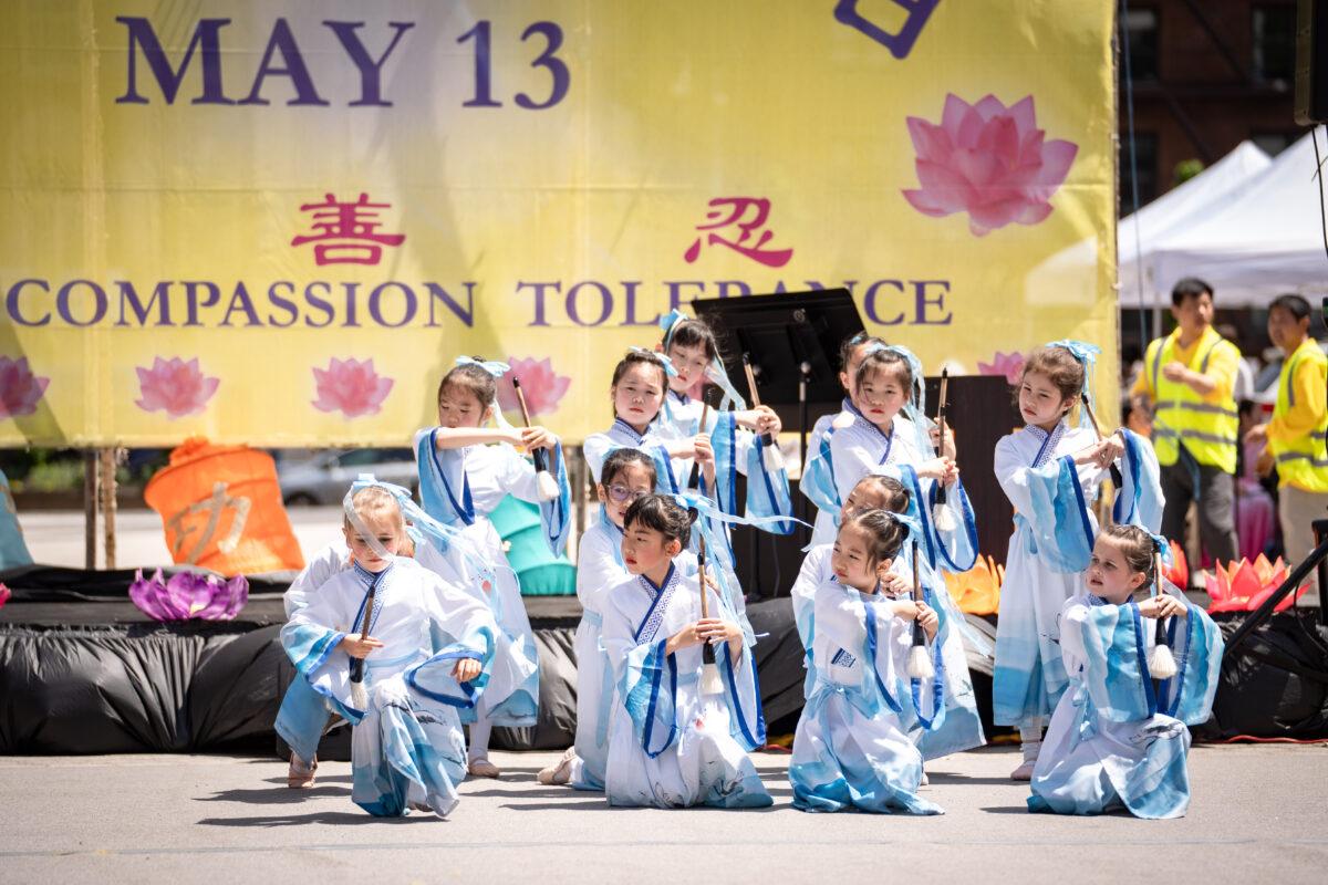 Falun Gong practitioners celebrate World Falun Dafa Day in New York City on May 7, 2023. (Samira Bouaou/The Epoch Times)