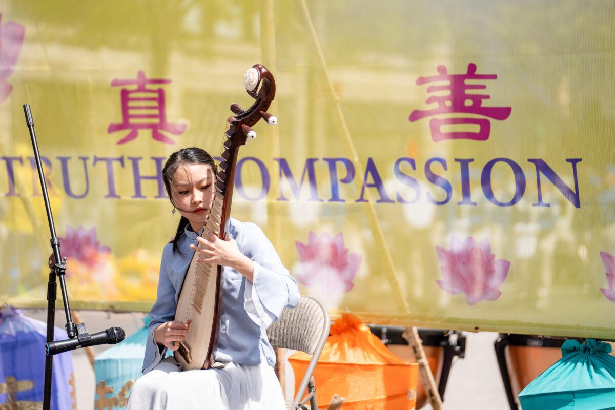 Falun Gong practitioners celebrate World Falun Dafa Day in New York City on May 7, 2023. (Samira Bouaou/The Epoch Times)