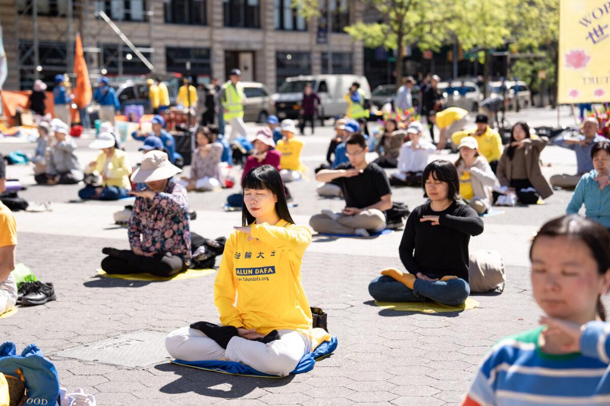 Falun Gong practitioners celebrate World Falun Dafa Day in New York City on May 7, 2023. (Samira Bouaou/The Epoch Times)