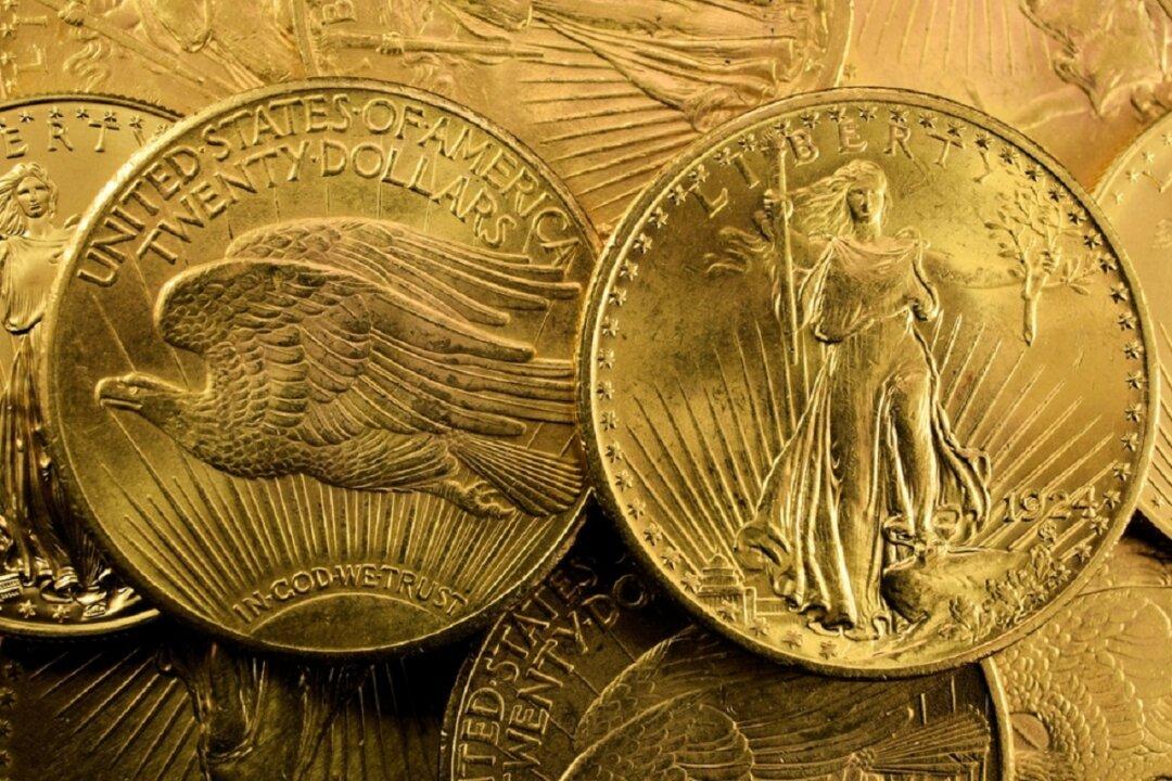 Gold Hits Record $2,300 Level After Fed Suggests Interest-Rate Cuts